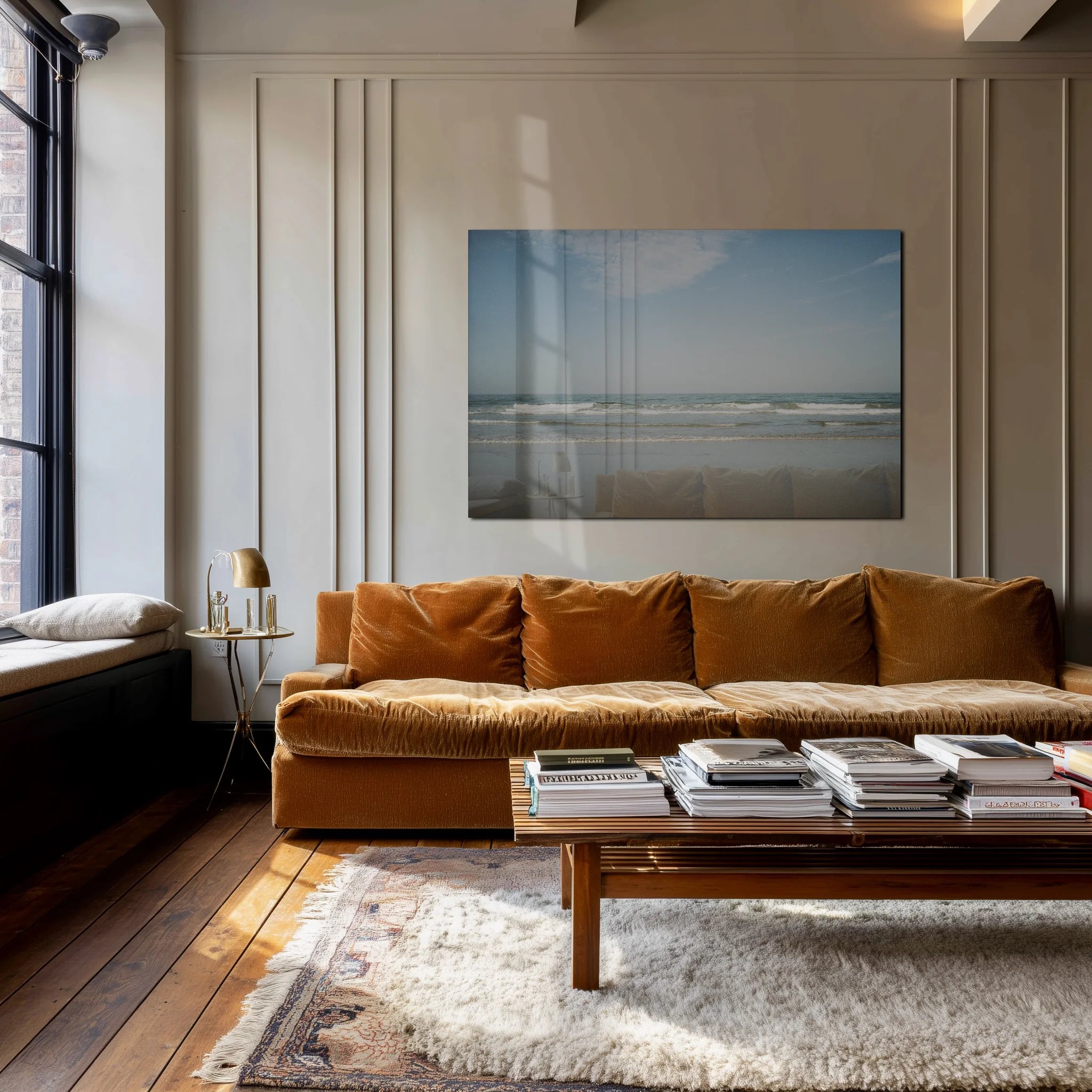 Distant Village in a softly lit reading corner above a leather armchair