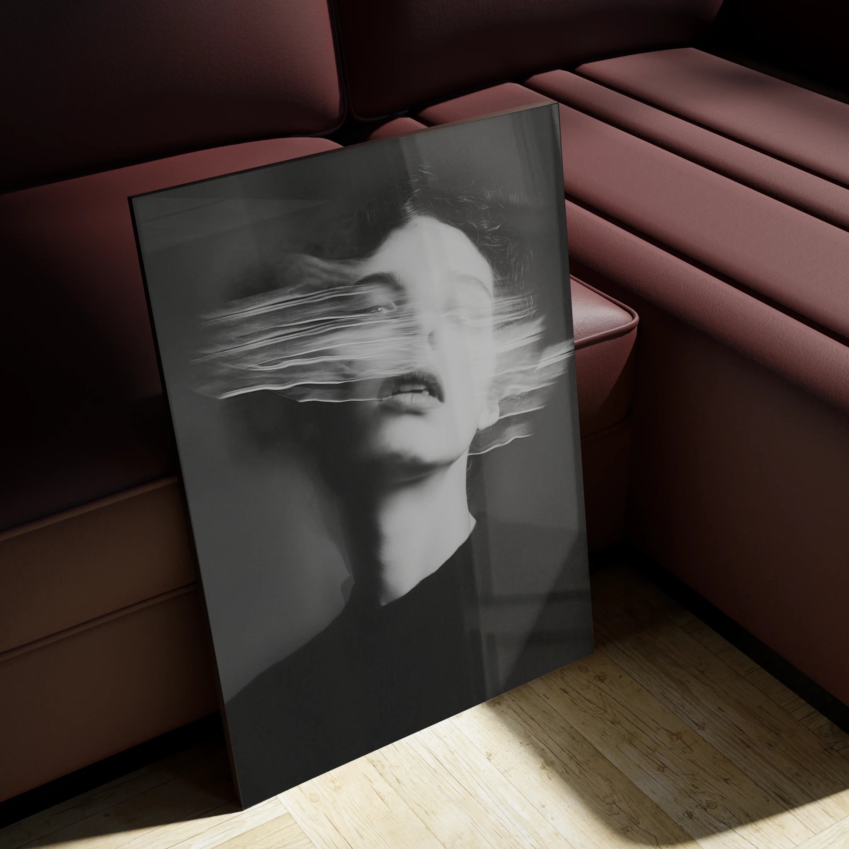 Ghosts Within 6 on a charcoal feature wall in a calm contemporary entry