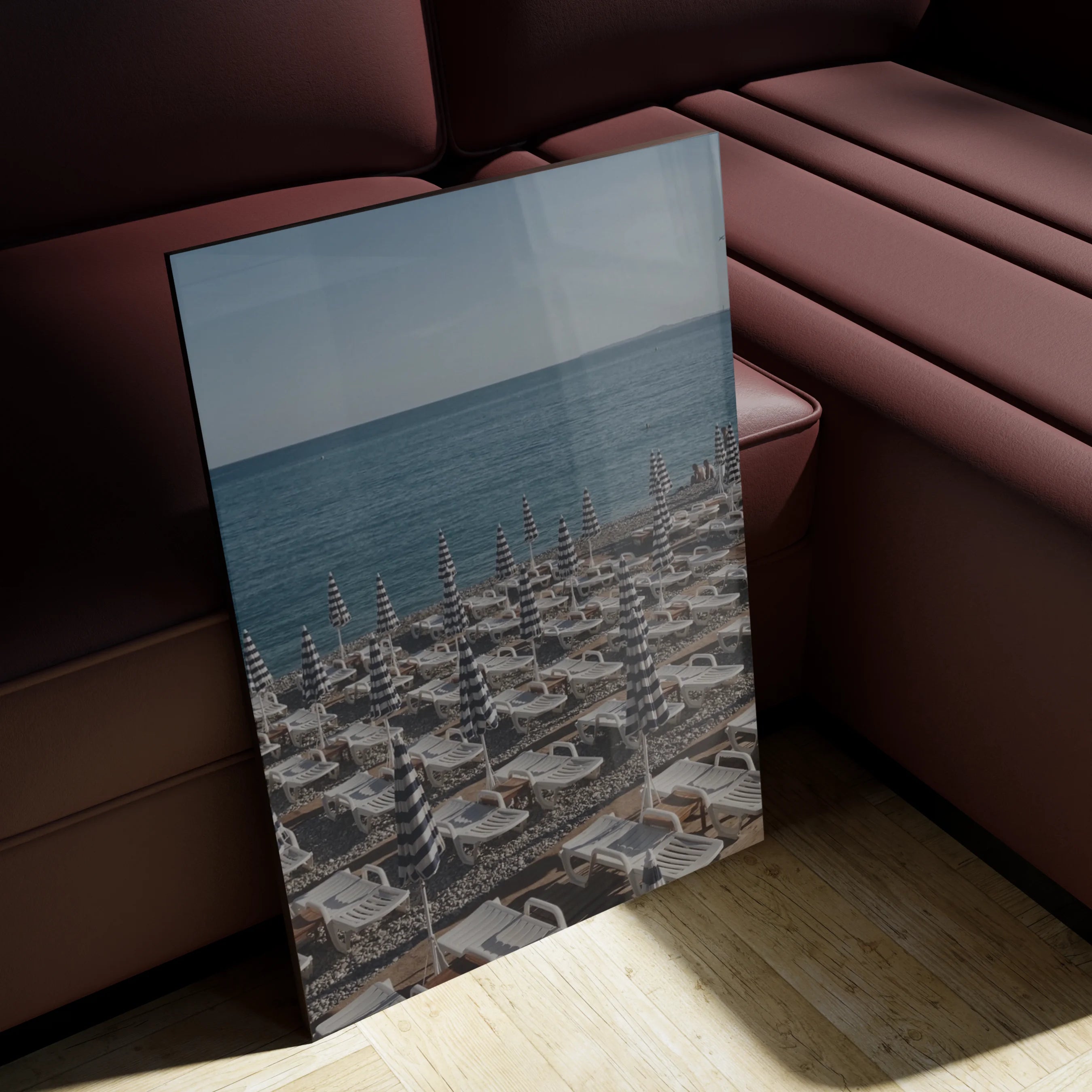 Grande Marina in a coastal-toned bedroom above a low oak headboard