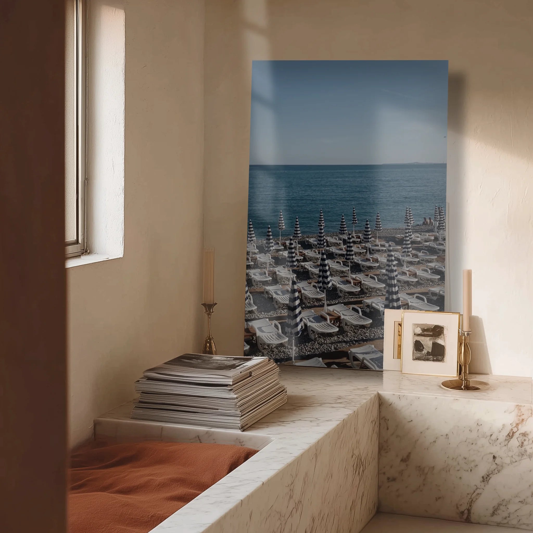 Il Porto in a coastal apartment with rattan armchair and natural fibre rug