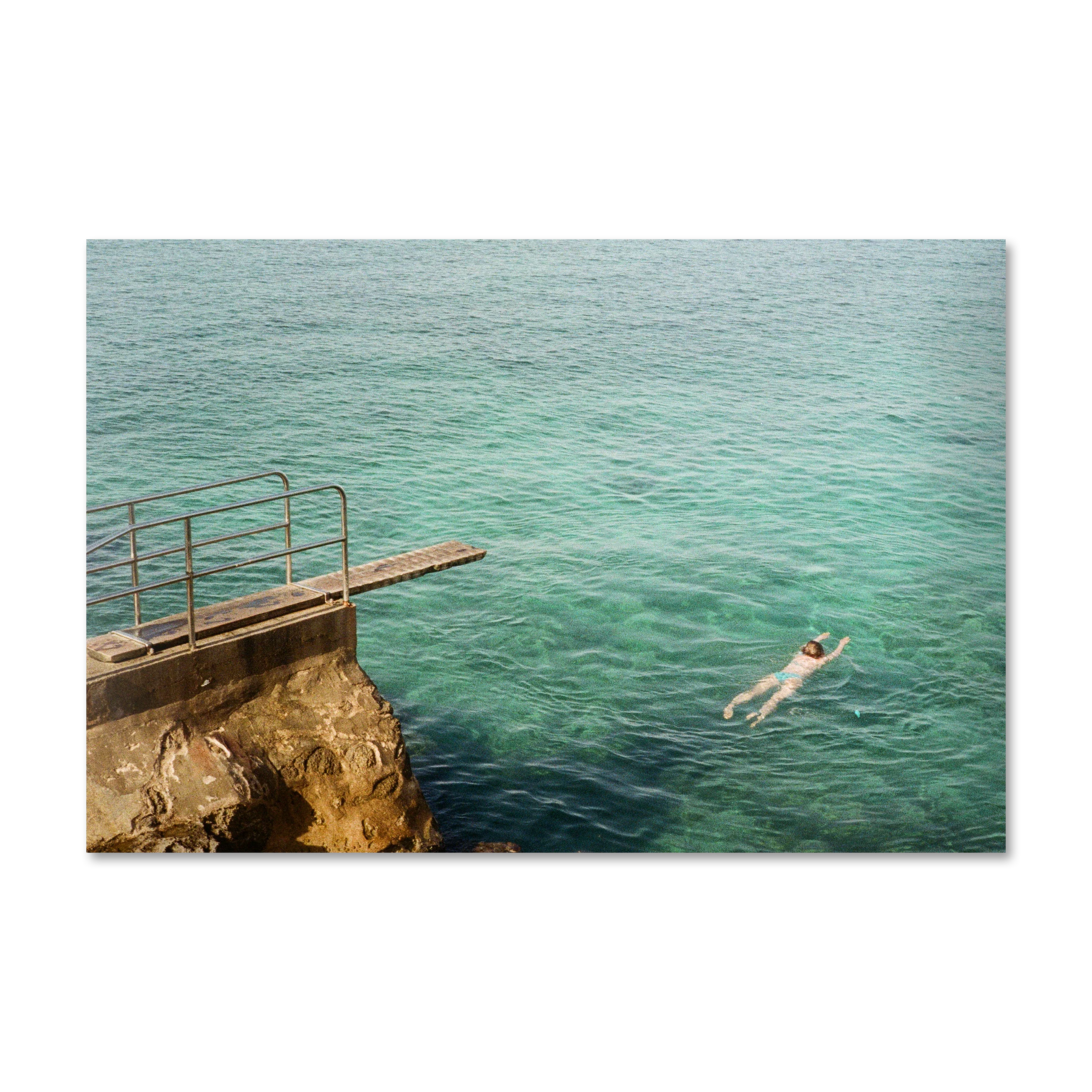 Mediterranean 2 The Swimmer — figure floating in turquoise Adriatic on Alu-Dibond