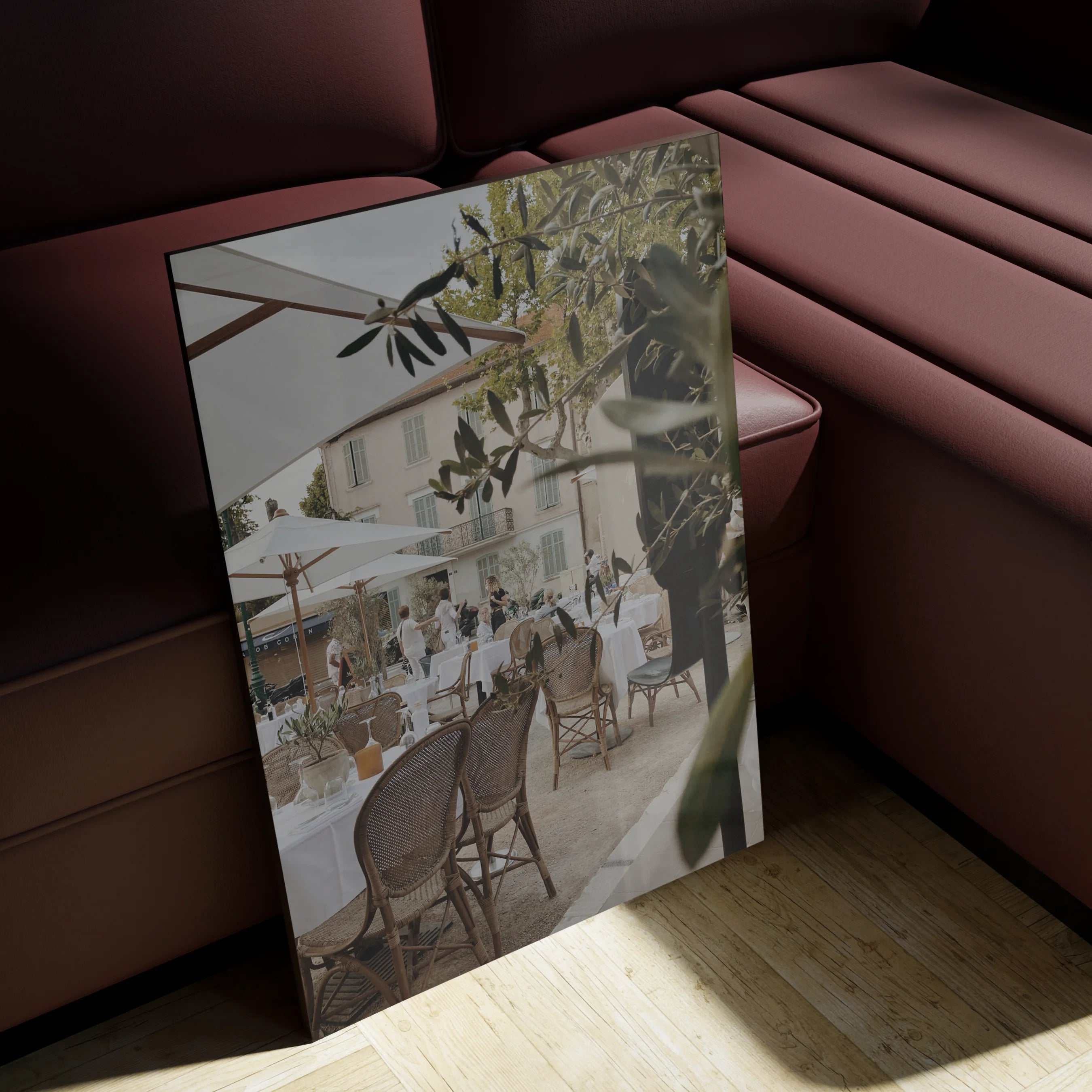 The Observer over a walnut sideboard in a Mediterranean-toned dining room